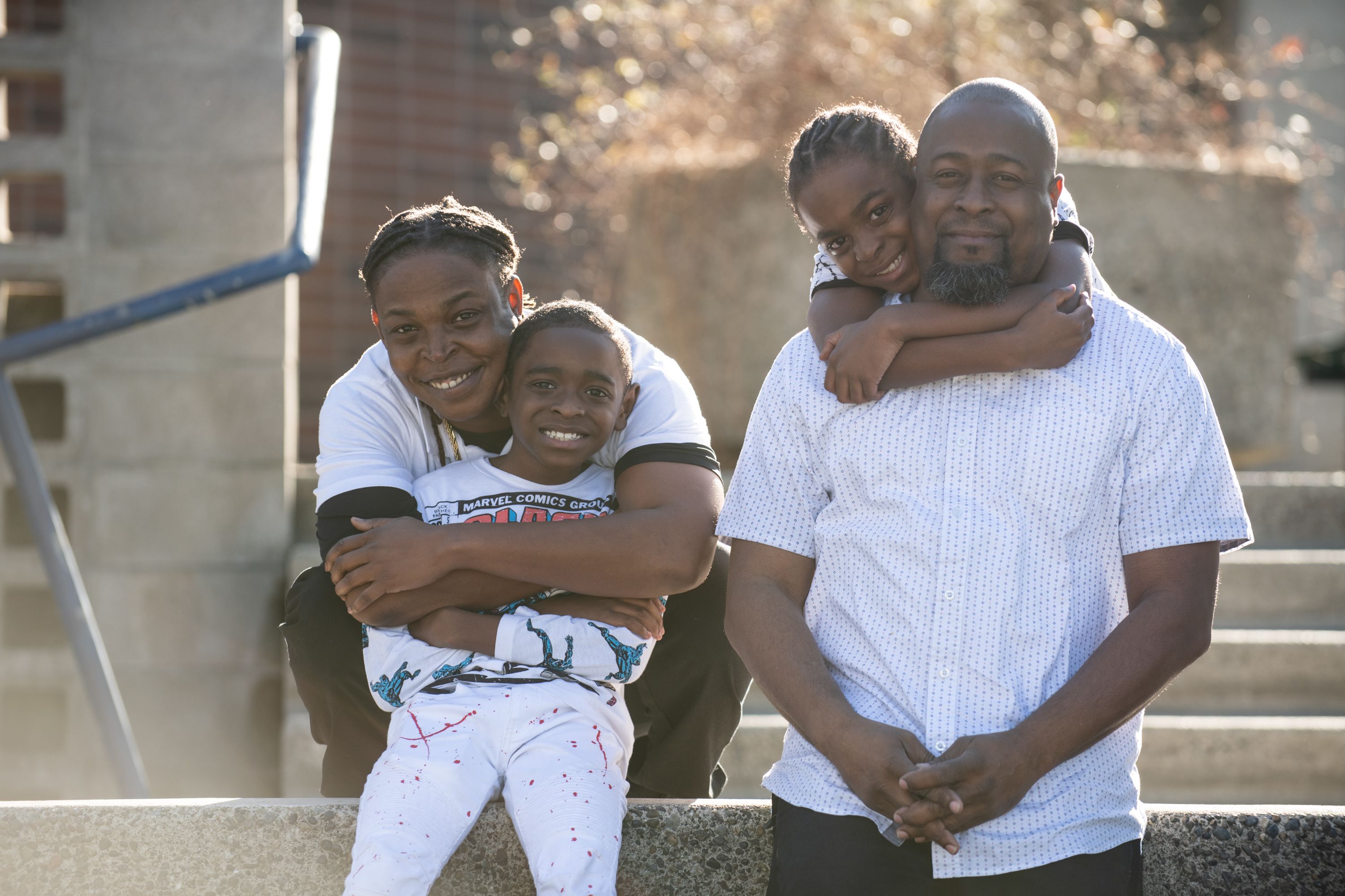 Photo of Drayton Jackson with his wife and two sons